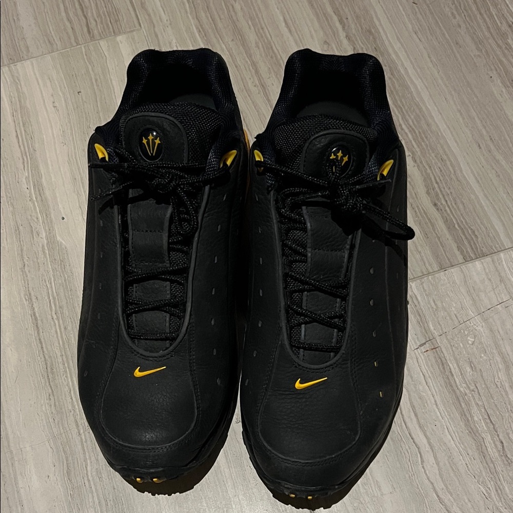 Like new.  Nike Hot Step Air Terra Drake NOCTA Black and Yellow Sneaker